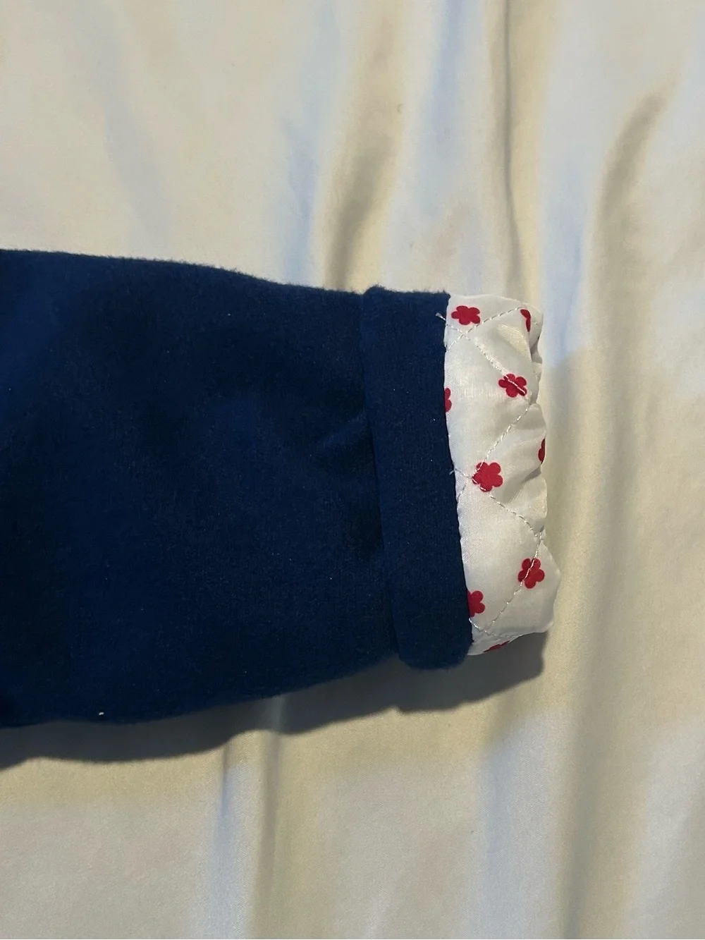 Little Me Navy Pea Coat with Red Scallop Trim and Bow.